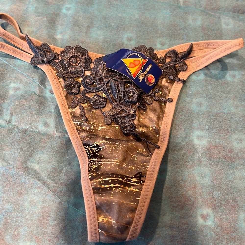 NWT size Medium grey thongs with lace embroidered front.